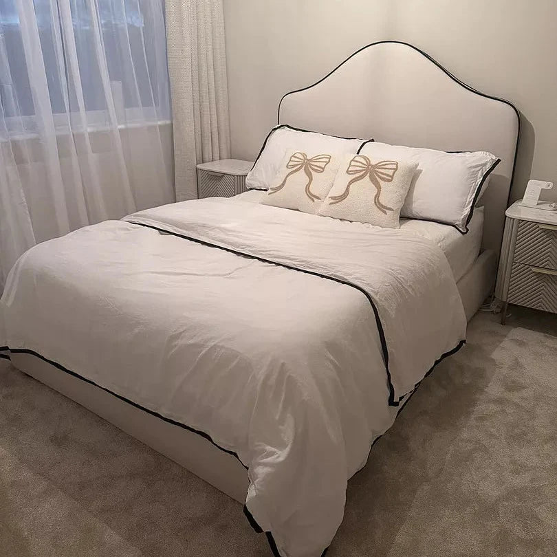 Odette Double Ottoman Bed - Ivory - Jet Black Piping